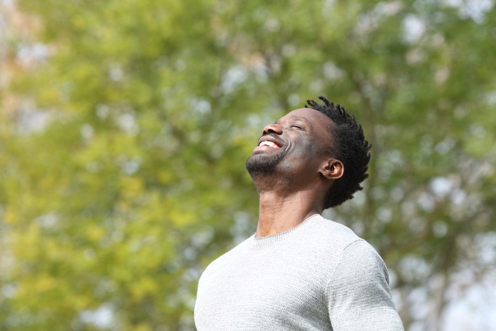 Happy,Black,Man,Breathing,Deeply,Fresh,Air,In,A,Park peripheral artery disease in st. louis, mo