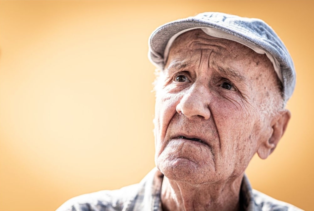 old man looking quizzical old man looking quizzical